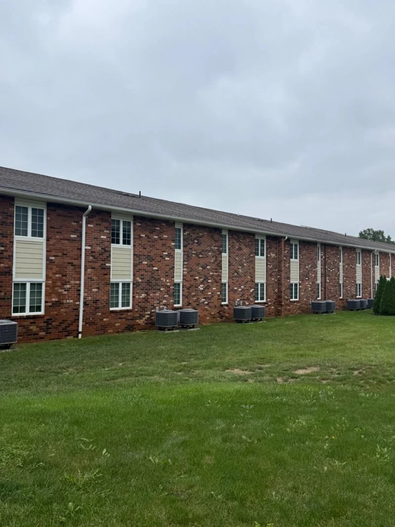 A multi-unit brick property featured in We Wash It's commercial project portfolio